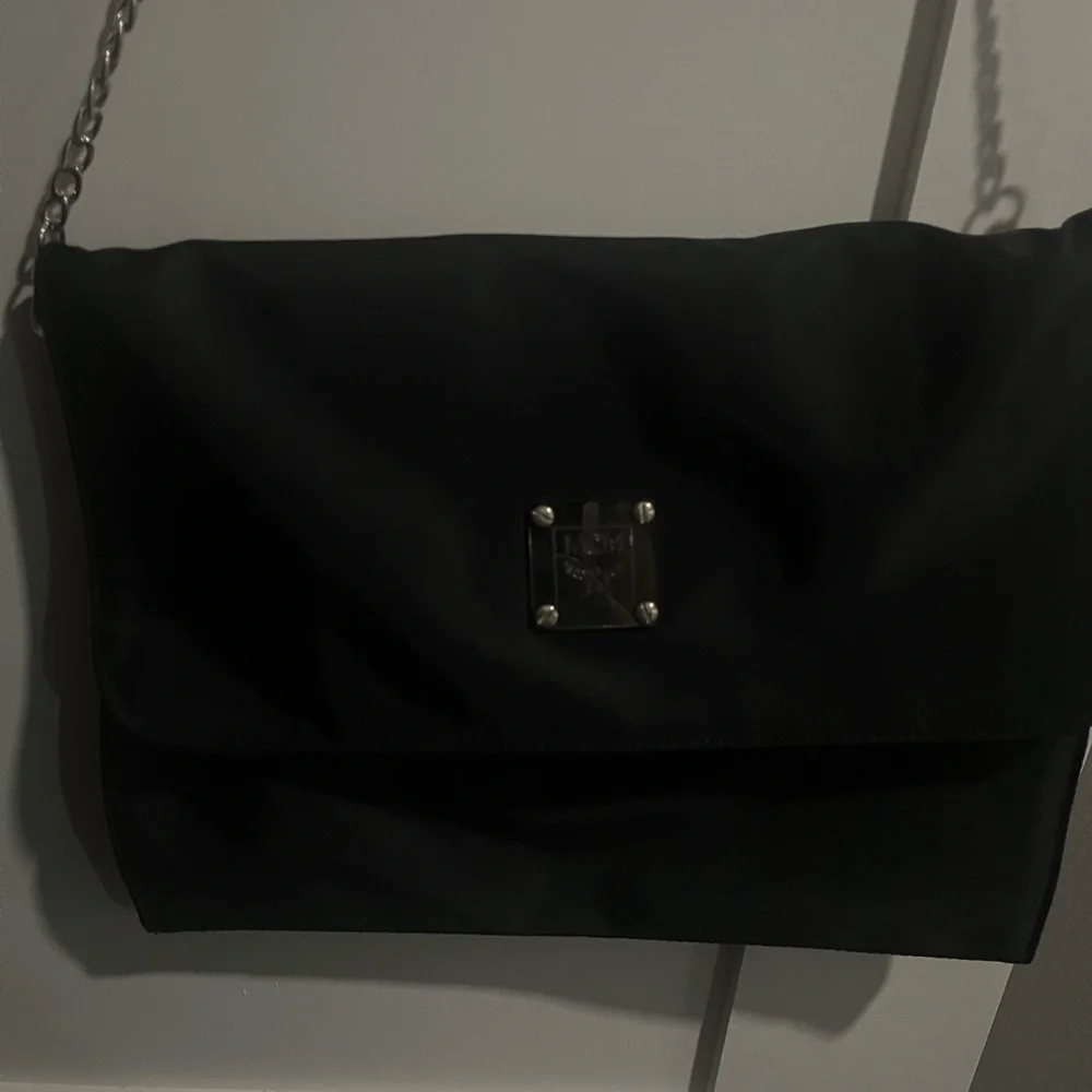 MCM Black Clutch Nylon RARE. Velcro attach. Chain does not come w/